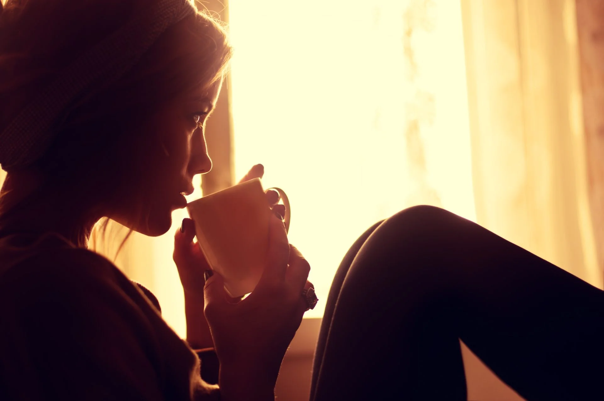 Woman drinking tea, health benefits